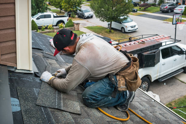 Professional Roofing technician working in Drake, CO